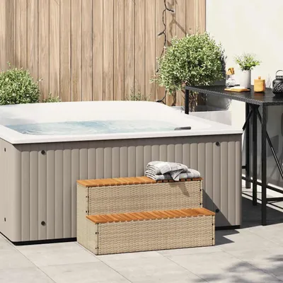 A set of steps for a whirlpool is shown in an outdoor setting.