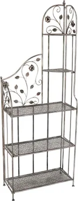 A metal plant stand with decorative scrollwork and leaf motifs.