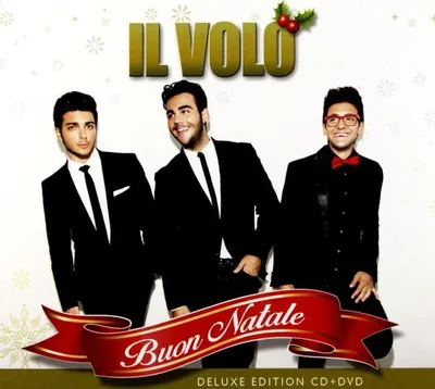 Three men in suits posing for a Christmas album cover.