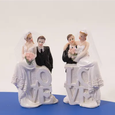 Produktbild von Hochzeitsfigur Liebespaar Braut und Bräutigam mit Love Schriftzug sortierter Artikel