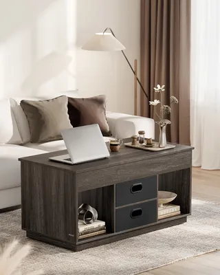 A living room scene with a couch, coffee table, and lamp.