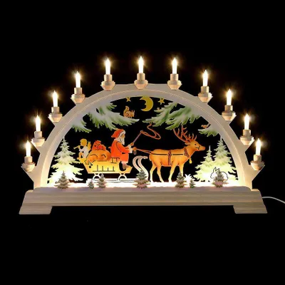 Produktbild von Schwibbogen Nikolaus mit Schlitten, farbig (65x40cm) von Kunstgewerbe Taulin