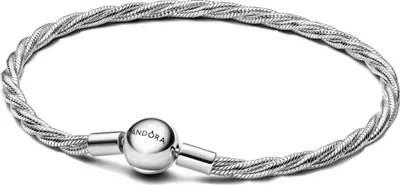 A silver Pandora bracelet with a round clasp is shown against a white background.