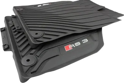 A pair of black rubber floor mats for a car, with the 'RS 3' logo visible on one of them.