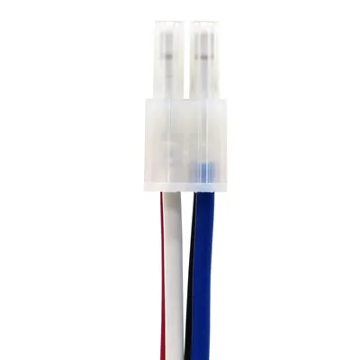 A close-up of a white electrical connector with three wires (red, white, and blue) extending from it.