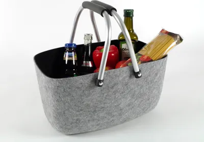A shopping basket filled with groceries.