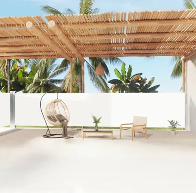 Imagen del producto de Toldo enrollable "Living Store" color crema, extensible, de 160 x 1200 cm