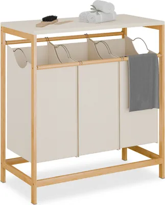 Image de Paniers à linge Relaxdays avec 3 paniers coulissants, tablette rabattable, dimensions : 84,5 x 78,5 x 40 cm, bambou, naturel/crème
