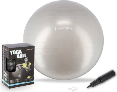A yoga ball, its packaging, and a pump are displayed against a white background.