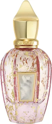A perfume bottle with a gold cap and pink glass decorated with gold flakes.