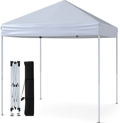A white pop-up canopy tent is shown fully assembled on a white background. To the left of the tent are its folded frame and a black carrying bag.