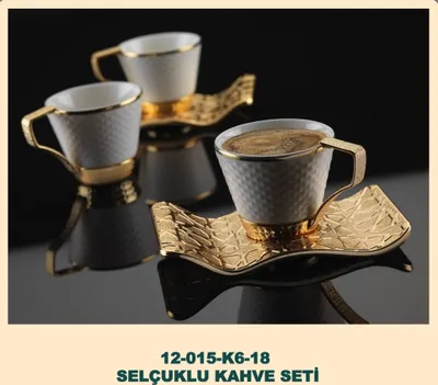 Produktbild von 12 Teiliges Kaffee Set, Espresso, Mokka aus Porzellan mit Goldenem Rand sowie Griff, dazu Unterteller aus Messing