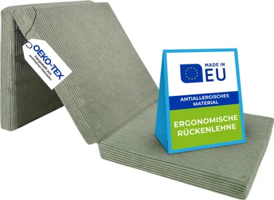 A folded mattress with certification labels.