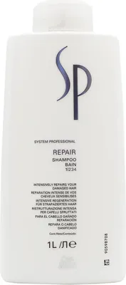A white bottle of Wella SP Repair Shampoo.