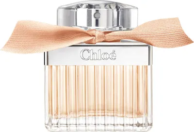 A close-up studio shot of a Chloé Rose Tangerine Eau de Toilette perfume bottle.