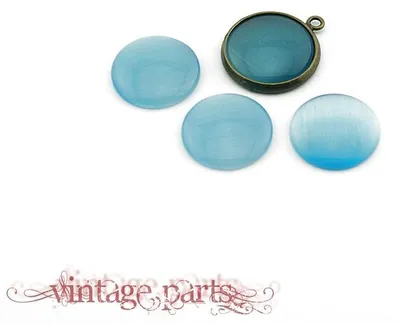 Produktbild von Vintageparts 6 Cateye Cabochons hellblau, 14 mm