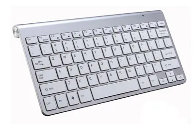 A silver wireless keyboard is shown against a white background.
