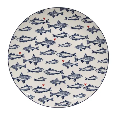 A round plate with a pattern of blue fish and red hearts on a white background.