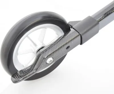A close-up view of a rollator's wheel and part of its frame, made of carbon fiber.