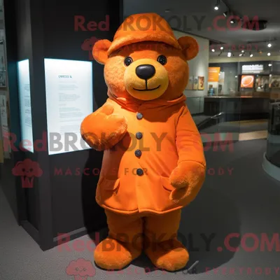 Produktbild von Orange REDBROKOLY Bär Maskottchen Kostüm Charakter gekleidet mit einem Mantel und Beanies