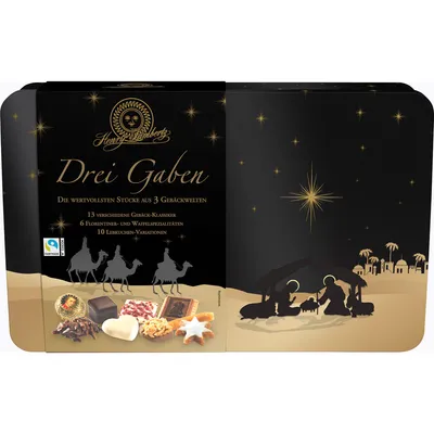 A festive tin of German gingerbread cookies with a Christmas nativity scene depicted on the right side and camels on the left.