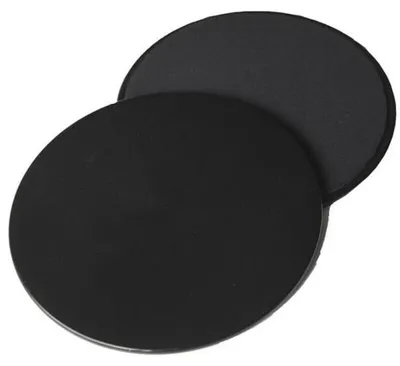 Zwei runde schwarze Pads, die sich leicht überlappen, auf weißem Hintergrund