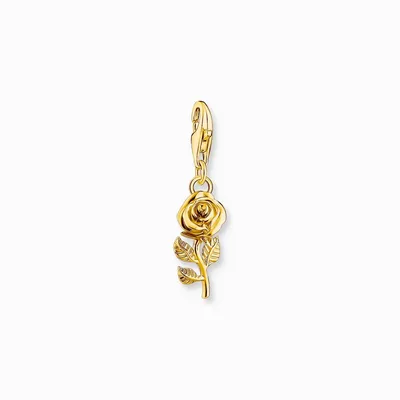 A gold rose charm with a clasp is shown against a white background.