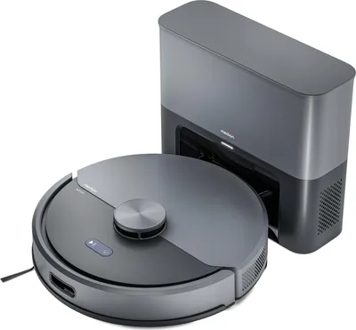 A robot vacuum cleaner and its charging station are shown against a white background.