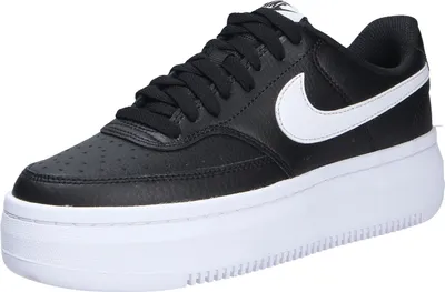 A black Nike Court Vision Alta Ltr shoe with a white sole and white Nike swoosh logo.