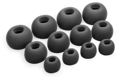 A collection of black silicone ear tips for headphones.