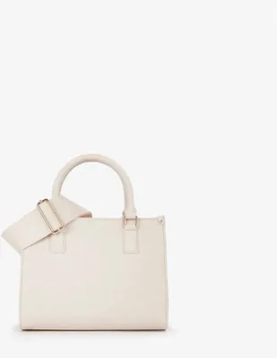 A white handbag with a shoulder strap is shown against a white background.