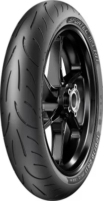 A motorcycle tire mounted on a wheel, shown against a white background.