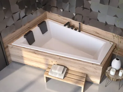 A modern bathroom with a built-in bathtub, wooden accents, and decorative wall tiles.