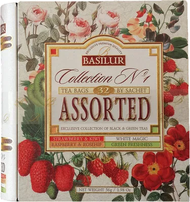 A close-up of a tea box with floral and fruit illustrations.