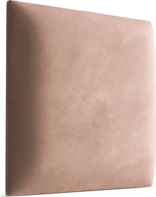 A close-up of a square padded headboard.