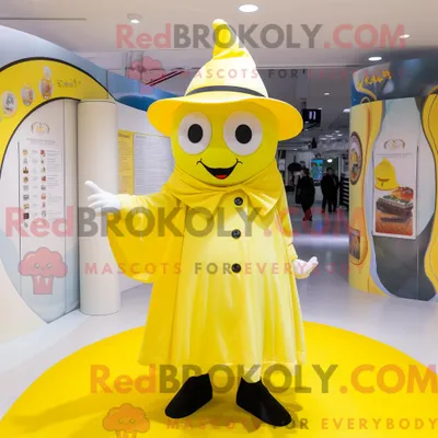 Produktbild von Maskottchenfigur REDBROKOLY eines zitronengelben Zirkusdirektors mit Culotte und Schal