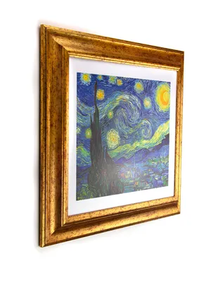 A framed painting of Van Gogh's Starry Night is shown against a white background.