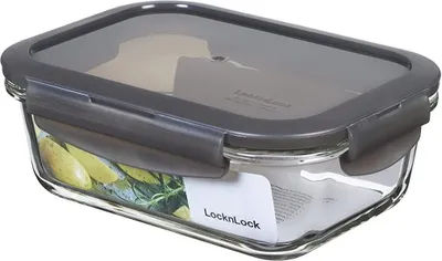 A glass food storage container with a gray lid.