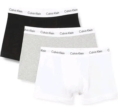 Three Calvin Klein boxer briefs are displayed in a stacked formation against a white background.