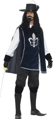 A man dressed in a musketeer costume.