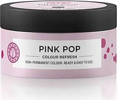 A pink jar of hair color refresh product with a black lid, set against a white background.