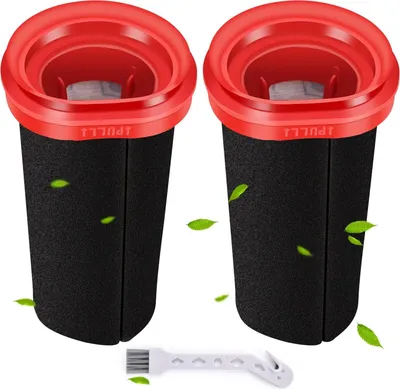 Two black vacuum cleaner filters with red tops and a small white cleaning brush are shown against a white background with green leaf graphics.