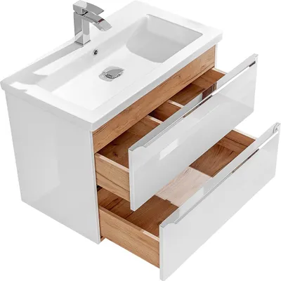 A white bathroom vanity with a ceramic sink and a chrome faucet. The vanity has two drawers, both partially open, revealing a wooden interior. The background is plain white.