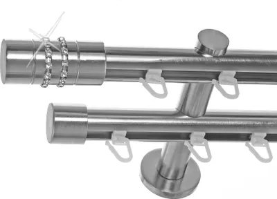 A close-up studio shot of a double curtain rod.