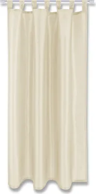 A plain beige curtain hanging from a rod.
