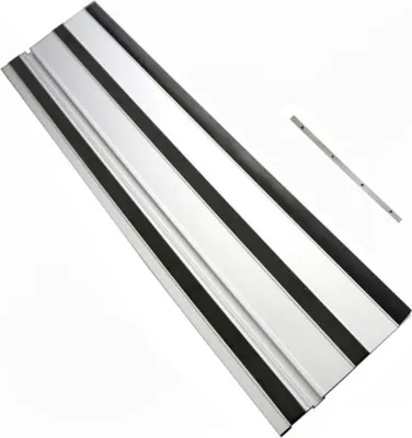 A silver guide rail with black rubber strips and a small metal piece with holes.