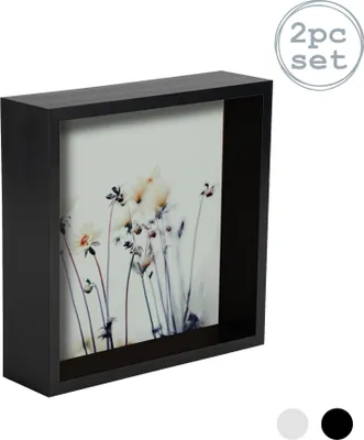 A black shadow box photo frame with a floral image inside, shown at an angle against a white background. A circular graphic indicating "2pc set" is in the upper right corner. Color swatches for black and white are at the bottom right.