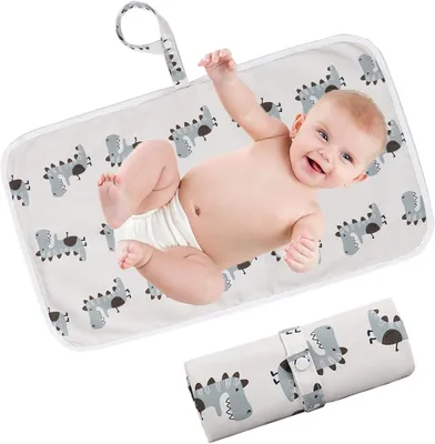 Immagine prodotto di Tavola pieghevole per il cambio del bambino, impermeabile, 60 x 35 cm, ideale per l'uso in viaggio