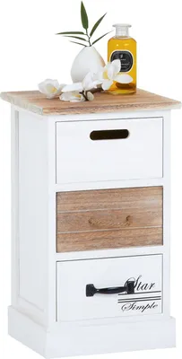 A white wooden cabinet with three drawers, a wooden top, and decorative items on top.