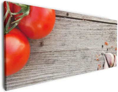 Produktbild von Wallario Premium Leinwandbild Tomaten und Gewürze auf altem Holztisch in Größe 50 x 125 cm